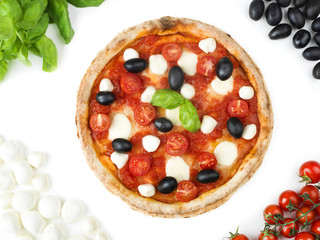 Italian pizza with tomato, mozzarella, basil and olives