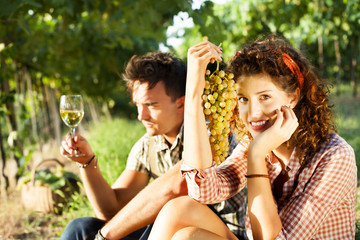 Fototapeta premium farming couple relaxing after the grape harvest