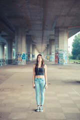 Fototapeta premium young beautiful brunette straight hair woman listening music