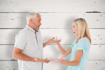 Obraz premium Composite image of unhappy couple having an argument