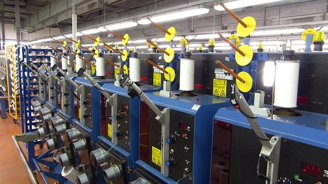 Textile manufacturing of synthetic fibers
