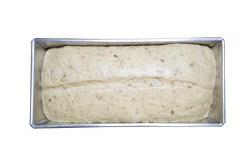 Bread dough in loaf tin