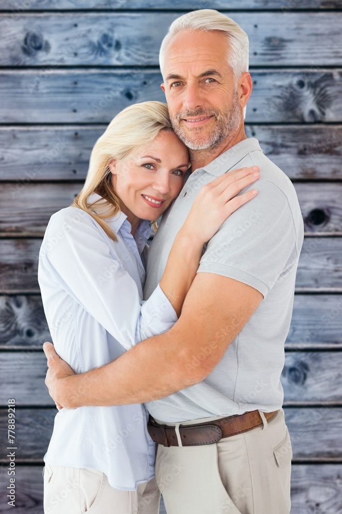 Poster composite image of happy couple standing and smiling at camera