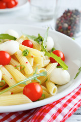 Penne with cherry tomatoes and mozzarella cheese