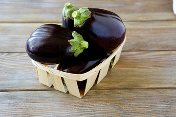 Heap of eggplant in a box