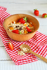Flakes with strawberries and dried apricots