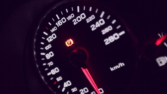 Close up of car dashboard and Odometer.