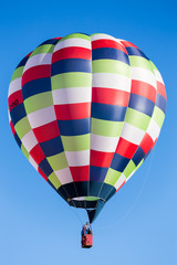 Naklejka premium colorful hot air balloon in flight