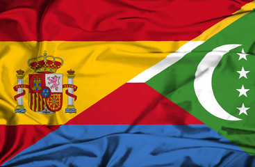 Waving flag of Comoros and Spain