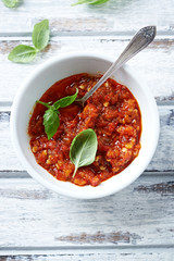 Chili pepper and garlic pesto in a small dish