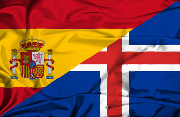 Waving flag of Iceland and Spain