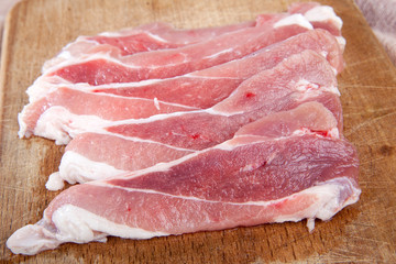 fresh raw meat on wooden background