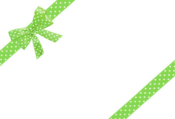 Realistic green ribbon and bow with tails.Isolated