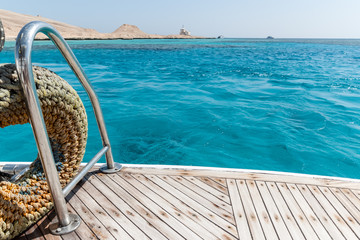 Close-up of a wooden deck end of a yacht