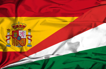Obraz premium Waving flag of Seychelles and Spain