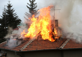 Burning house roof