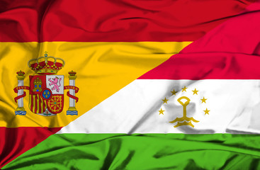 Waving flag of Tajikistan and Spain