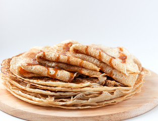 Thin pancakes, crepes with caramel syrup