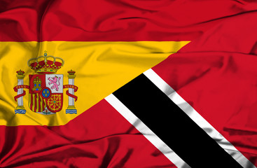 Waving flag of Trinidad and Tobago and Spain