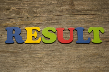 result word on a wooden background
