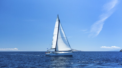 Obraz premium Sailing off the coast of Greece. Luxury yachts.