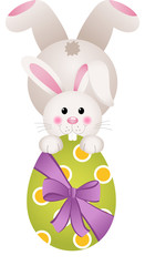 Easter bunny holding a large chocolate egg
