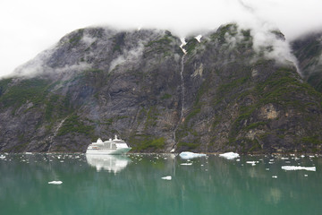 Alaska Cruise Ship Near Mountain with Clouds