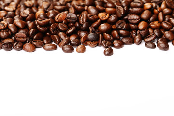 stripe of coffee beans isolated on white