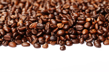 stripe of coffee beans isolated on white