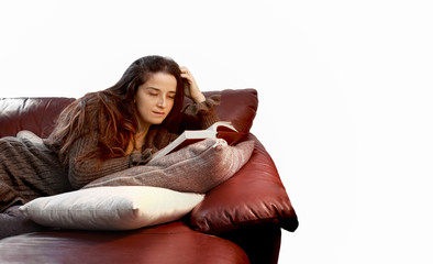 woman in relax over sofa reading a book