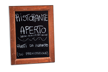 blackboard outside an open italian restaurant isolated