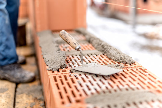 Detail of construction site, trowel or putty knife