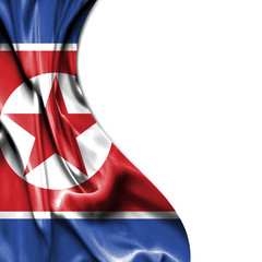 North Korea waving satin flag isolated on white background
