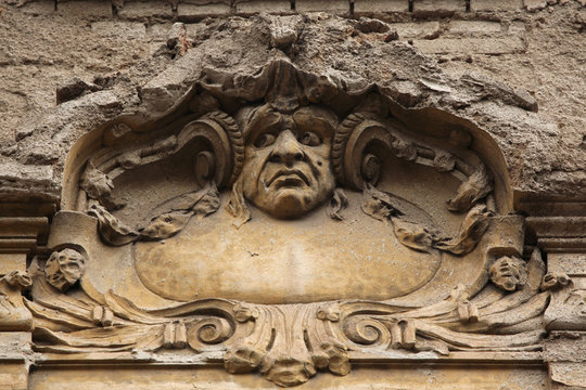 Funny mascaron on the Art Nouveau building