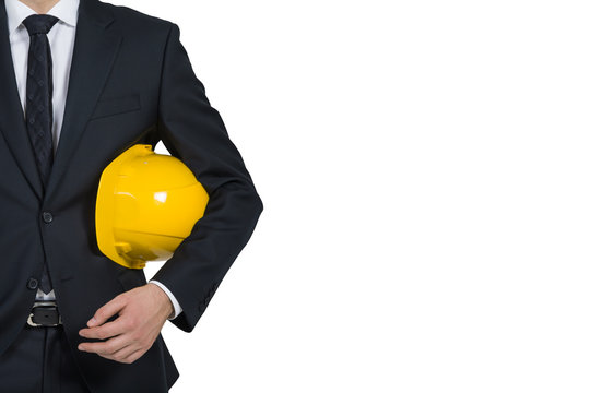 Businessman Engineer Holding Helmet