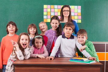 Children in elementary school with their teacher