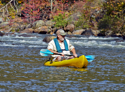 Older Man In Kayak