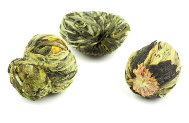 Aromatic flower green tea on white background