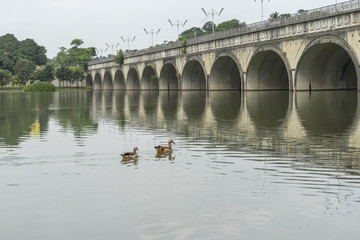 Lake and concrete bridge