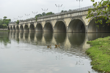 Fototapeta premium Lake with concrete bridge