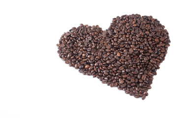 Roasted coffee beans in heart shape