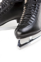 Plakat Pair of Professional Male Figure Skates Together. isolated Over