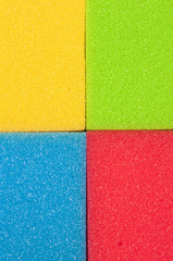 Fototapeta premium Closeup of Four Colorful Kitchen Sponges