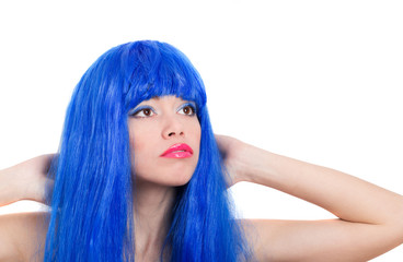 Portrait of beautiful woman in  blue wig