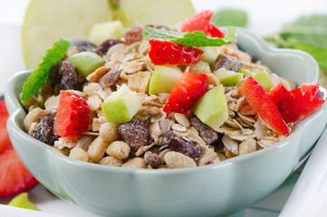 Healthy muesli and ripe fruits for breakfast