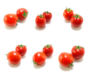 collection of tomatoes with a light shadows isolated on white