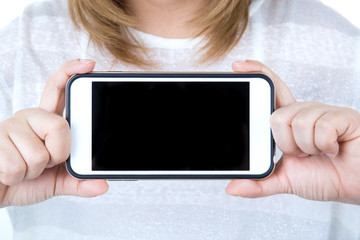 Isolated female hands holding the phone