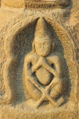Buddha sculpted from stone.