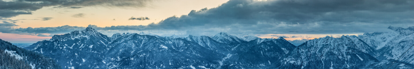 panorama of austrian snow mountain peaks at winter