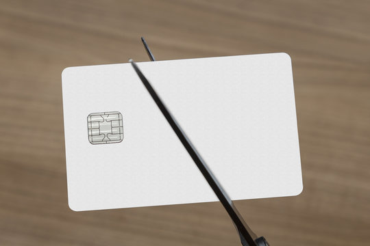 scissors cutting a credit or debit card